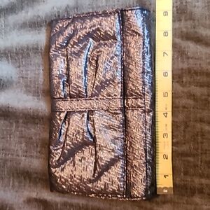 Lancome Paris silver and black clutch